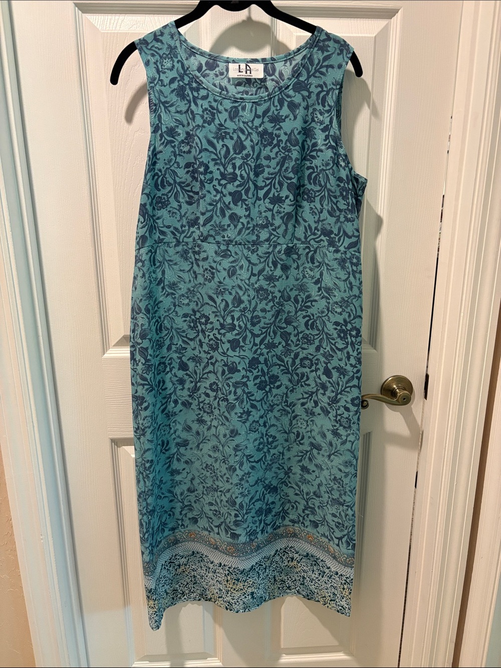 Sleeveless Teal Midi Dress with Floral Motif